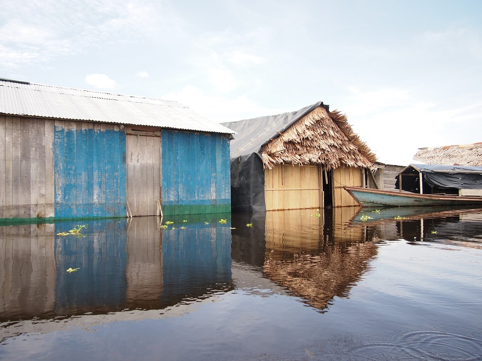 photo of Iquitos with houses on the watter